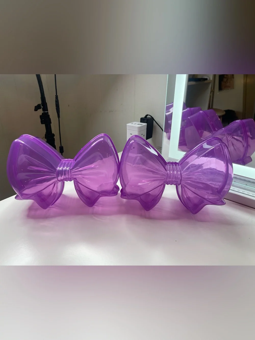 2 purple bow storage containers 9